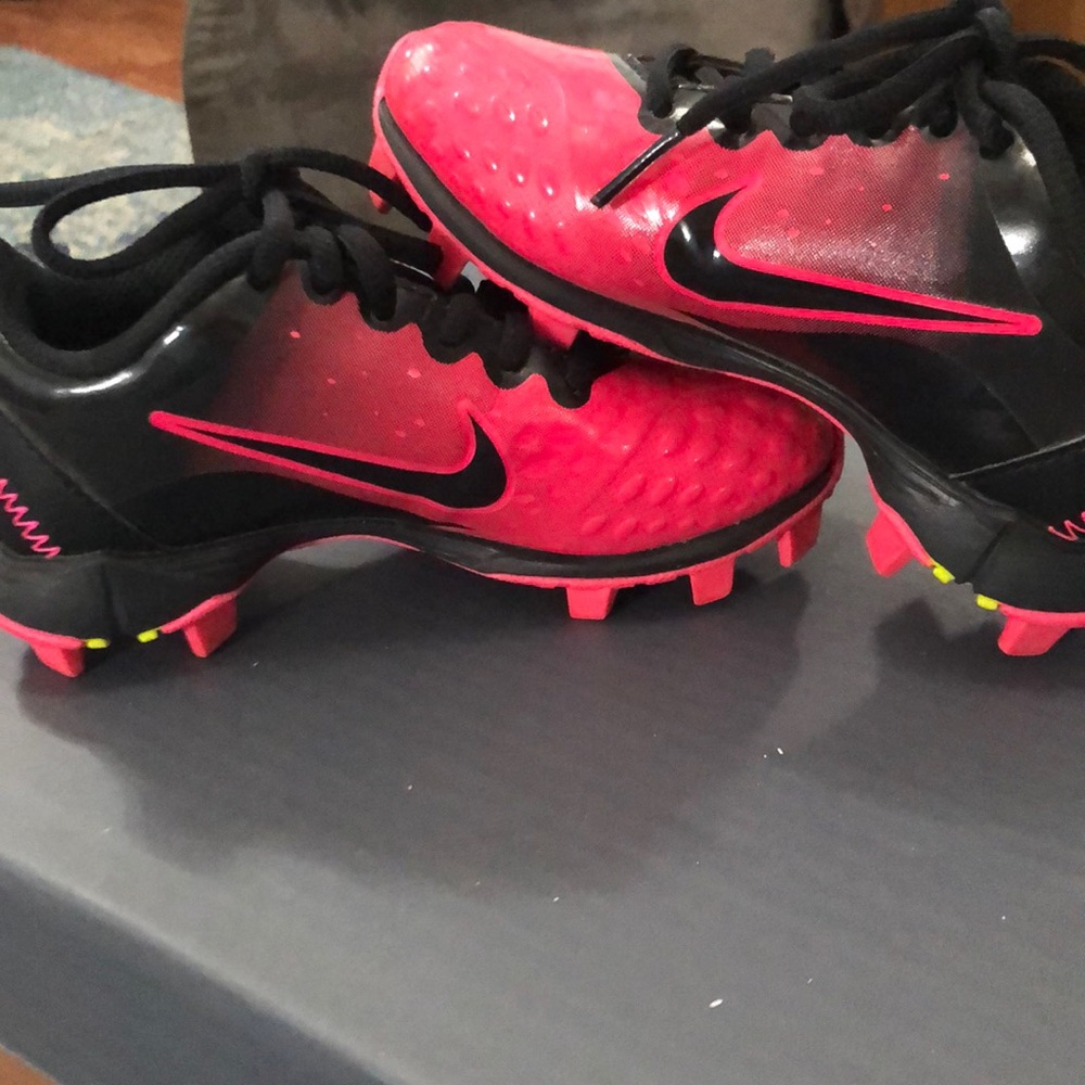 Hot pink Nike cleats